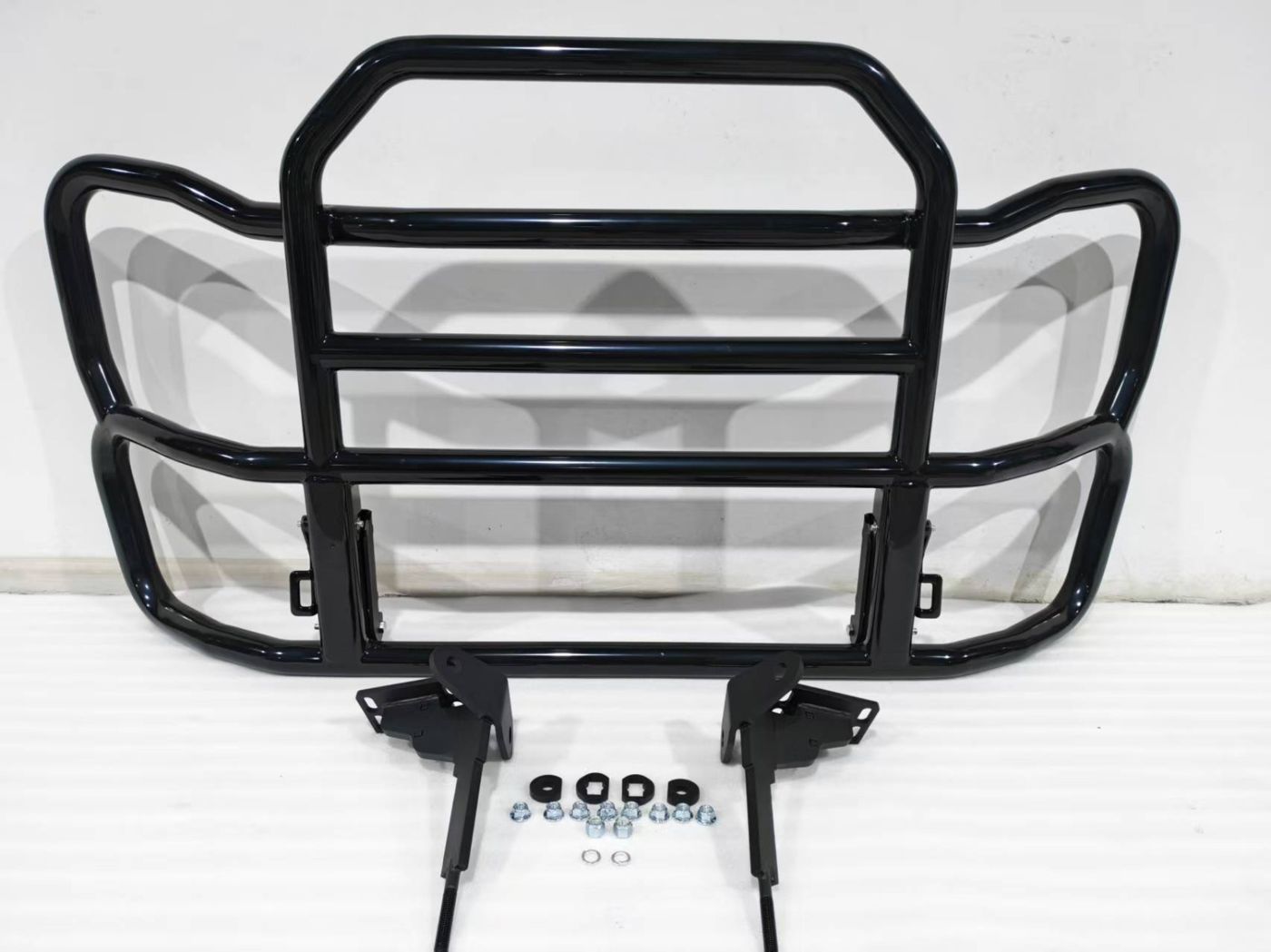 Black heavy-duty deer guard with mounting brackets